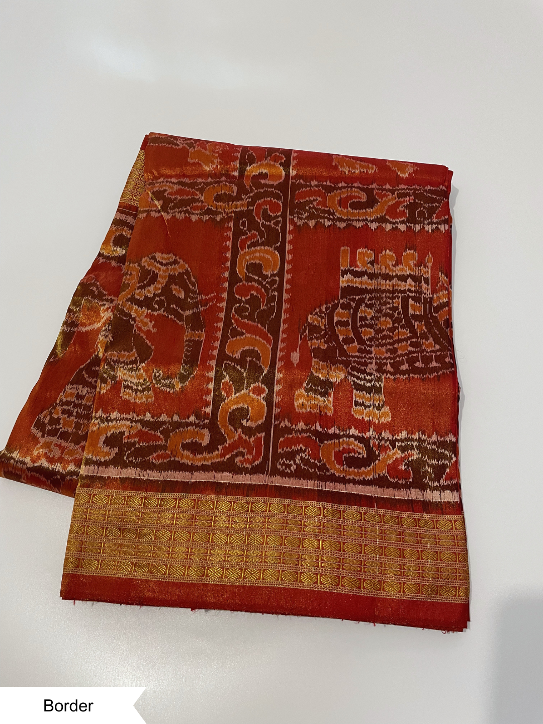 Gajasingha Chakra — Antique Copper & Burnt Saffron | Tissue Sambalpuri Silk Saree